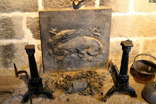 Reflecting iron plate with royal salamander symbol of French King, François I in Cartier's bedroom at Jacques Cartier Manor House Museum. St Malo, France.