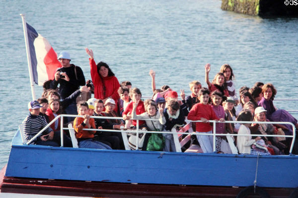 School children enjoying a cruise. Gulf of Morbihan, France.