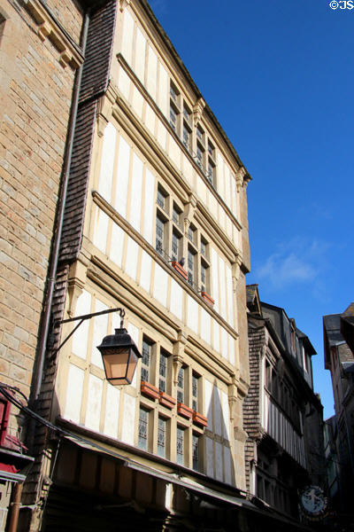 Old fashioned style hanging lamp along Grande Rue. Mont-St-Michel, France.