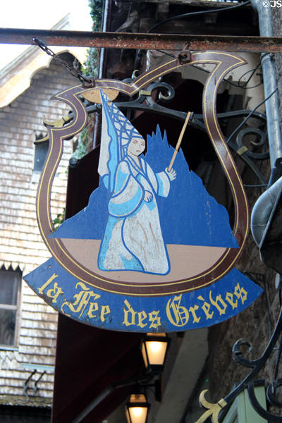 Shop named after French novel along Grande Rue. Mont-St-Michel, France.
