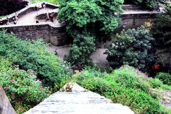 Conveyer ramp seen from above was once operated by men walking inside wheel. Mont-St-Michel, France.