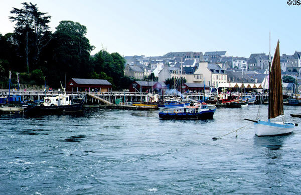 Busy deep water port & old town rising from harbor. Douarnenez, France.