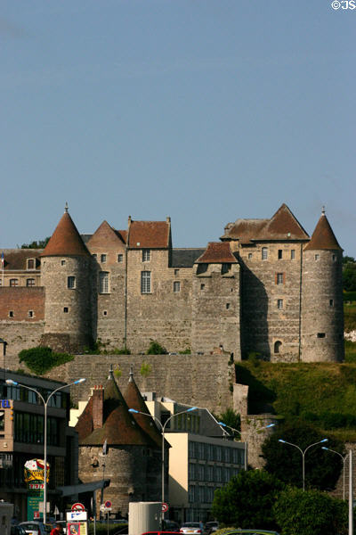 Dieppe Castle built with alternate blocks of flint & sandstone standing above Les Tourelle old city gates & town. Dieppe, France.