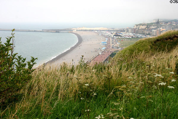 Wide curved shingle beach along ocean. Dieppe, France.