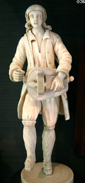Bone carving of hurdy gurdy player at Dieppe Castle Museum. Dieppe, France.
