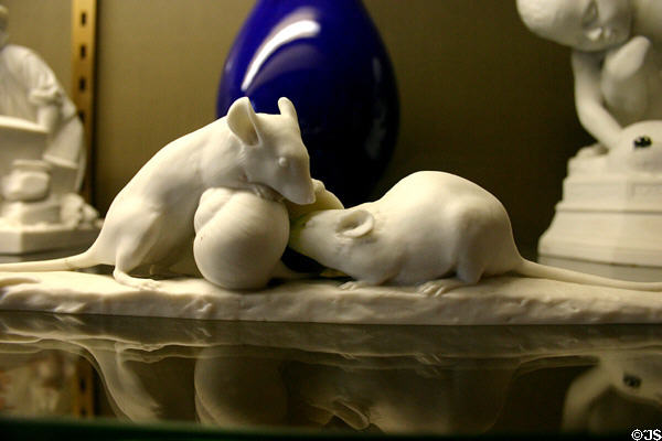 Bone carving of mice looking over snail shell at Dieppe Castle Museum. Dieppe, France.