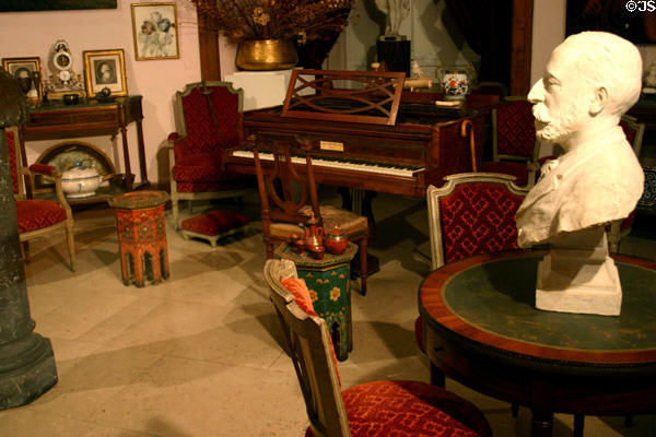 Room with piano & antiques at Dieppe Castle Museum. Dieppe, France.