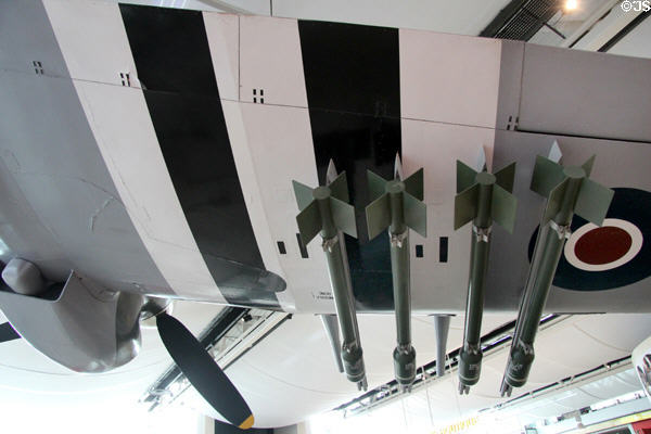 Underwing armaments of Hawker Typhoon used to keep German tanks & troops from roads in Normandy invasion with D-Day stripes markings at Caen Memorial. Caen, France.