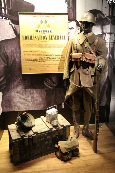 French General Mobilization Order poster (1939) & uniform kit at Caen Memorial. Caen, France.