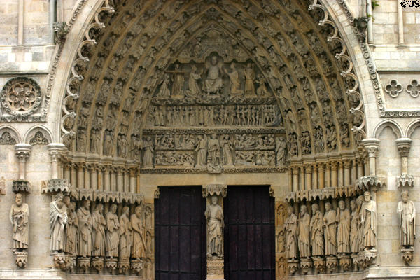 Saints flanking central portal of Amiens Cathedral. Amiens, France.