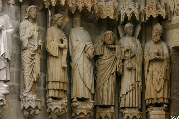 Saints carved on facade of Amiens Cathedral. Amiens, France.