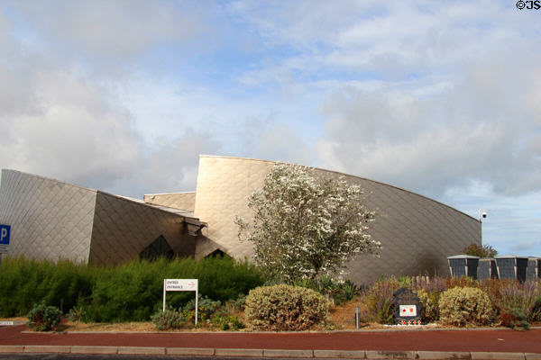 Facade of Juno Beach Centre covered by Titanium scales. Courseulles-sur-Mer, France.