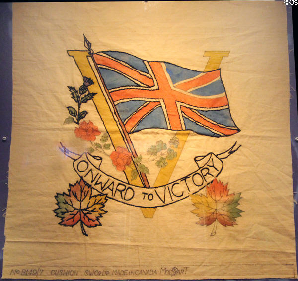 Onward to Victory Canadian WWII printed cushion cover at Juno Beach Centre. Courseulles-sur-Mer, France.