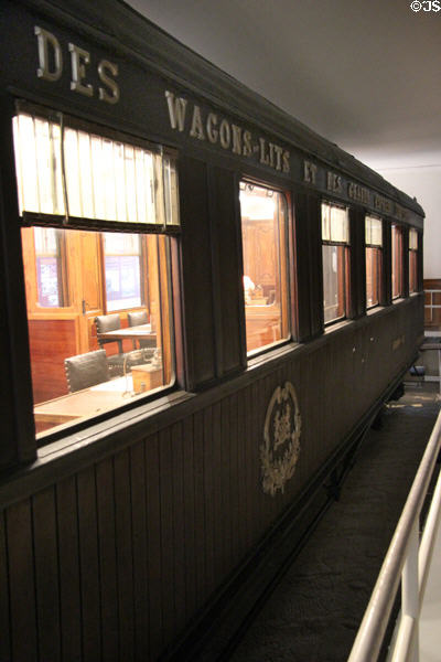 Side of Armistice Rail Car with name & emblem of maker Wagon-Lits at Armistice Rail Car clearing. Compiègne, France.