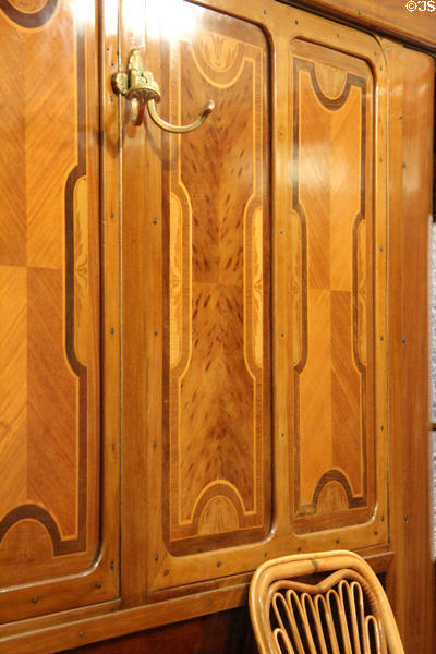 Highly polished cupboard doors with marquetry in Armistice Rail Car at Armistice Rail Car clearing. Compiègne, France.