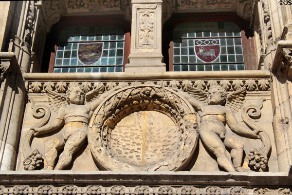 Carved cherubs on House of Exchequer. Rouen, France.