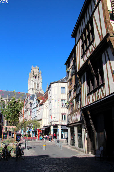 Flamboyant Gothic St-Ouen Abbey Church over Medieval half-timbered houses. Rouen, France.