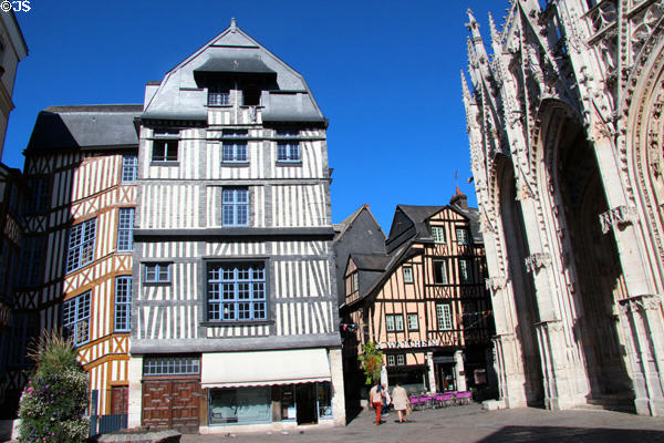 Half-timbered buildings surround St Maclou church. Rouen, France.