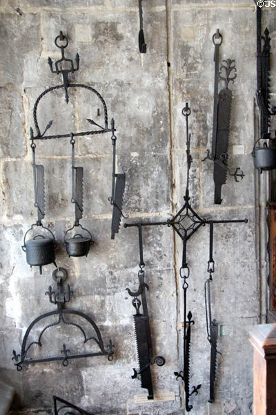 Fireplace pot holding ratchets in iron at Wrought Iron Museum. Rouen, France.