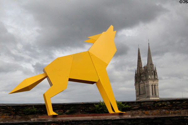 Modern style sculpted wolf atop wall at Angers Chateau. Angers, France.