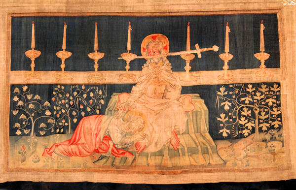 Christ with sword & 7 candlesticks from Apocalypse Tapestry at Angers Chateau. Angers, France.