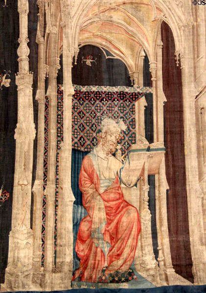 Large figure under a canopy introducing a new section of Apocalypse Tapestry at Angers Chateau. Angers, France.