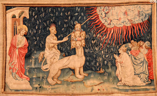 Beast of the earth causes fire to fall from heaven from Apocalypse Tapestry at Angers Chateau. Angers, France.