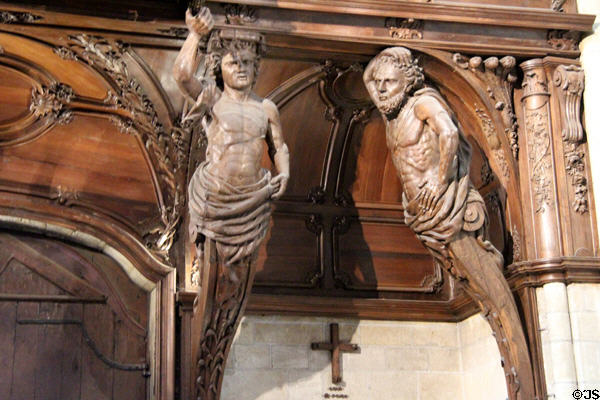 Detail of telamones supporting organs at St Maurice of Angers Cathedral. Angers, France.