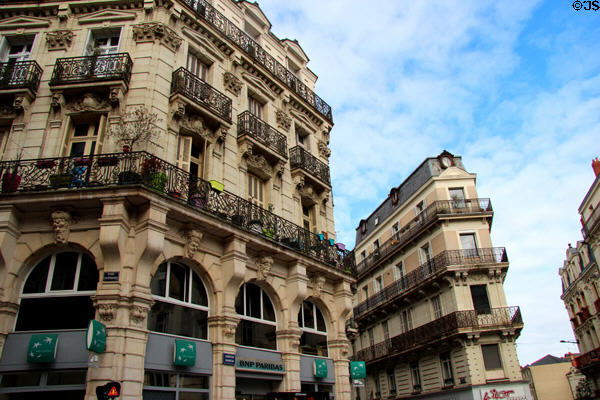 Ornate wrought iron balconies on beaux arts buildings in Angers center. Angers, France.