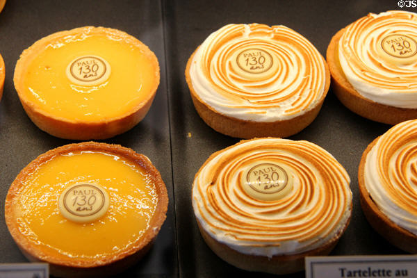 Lemon & meringue tartelettes in Paul's bakery window. Angers, France.