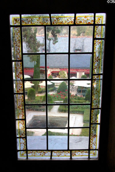 View of garden through upper story window at Château de Clos Lucé. Amboise, France.