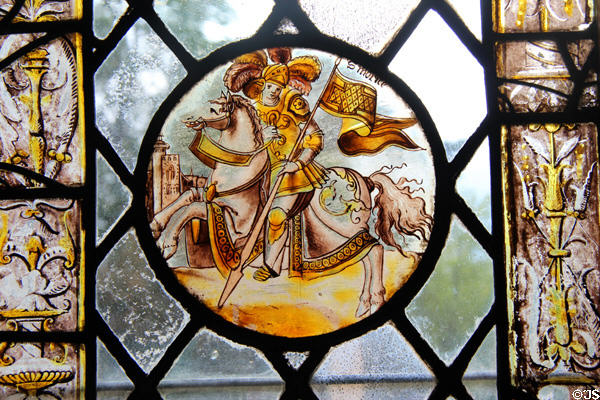 Window with stained glass medallion of knight on horseback at Château de Clos Lucé. Amboise, France.