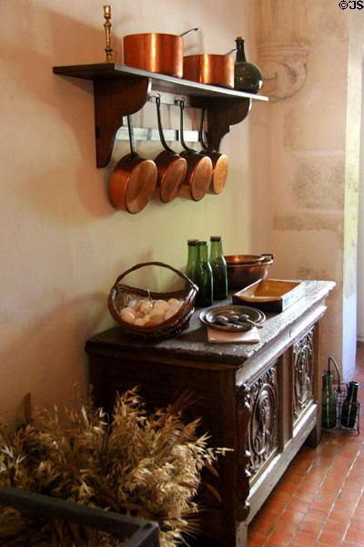 Carved chest & copper pans in kitchen of Château d'Azay-le-Rideau. Azay-le-Rideau, France.