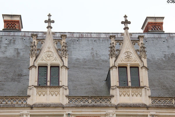 Dormer windows of Louis XII Gothic wing (1498-1500) at Blois Chateau. Blois, France.