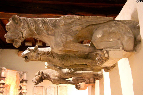 Mythical creature gargoyles in architecture gallery since replicated for exterior use at Blois Chateau. Blois, France.