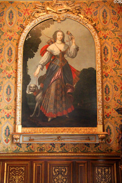 Portrait of Laura Vittoria Mancini owner of Chenonceau in 17thC dressed as Diana the Huntress in François I drawing room at Chenonceau Chateau. Chenonceau, France.