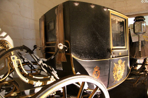 Horse-drawn Berlin carriage of count of Chambord (1873) by Binder Brothers at Chambord Chateau. Chambord, France.