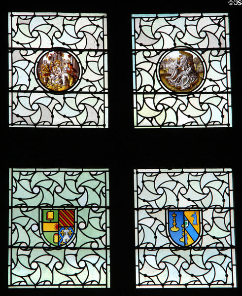 Windows with painted scenes & crests at Chaumont-Sur-Loire. France.