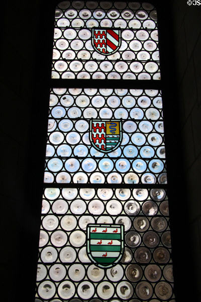 Stained glass composed of blown-glass roundels at Chaumont-Sur-Loire. France.