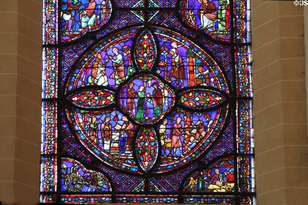 Detail from Life of St Anthony of the Desert stained glass window at Chartres Cathedral. Chartres, France.
