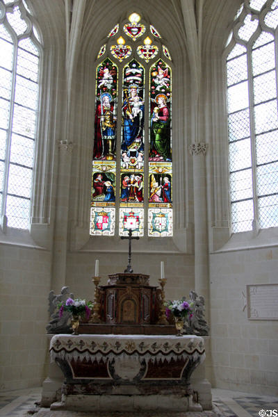 Stained glass window over alter in Chapel St Anne d'Usse at Chateau D'Ussé. Ussé, France.
