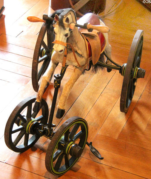 Wheeled rocking horse from time of Napoleon III in nursery at Cheverny Chateau. Cheverny, France.