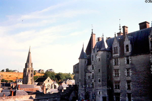Langeais Chateau with town & spire of Saint-Jean -Baptiste church. Langeais, France.