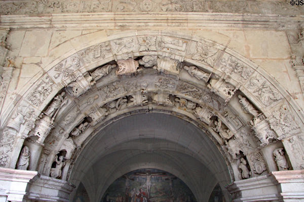 Carved arch (1543) within cloister at Fontevraud Abbey. Fontevraud, France.