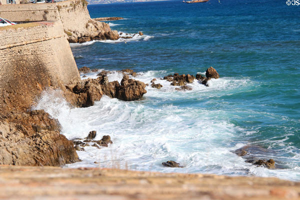 Sea pounding ramparts (17thC). Antibes, France.
