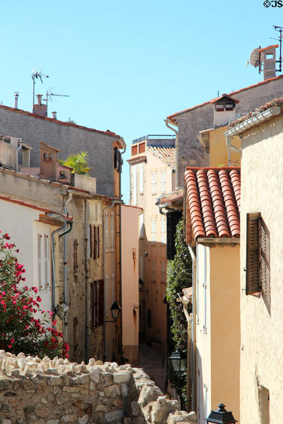 Narrow winding street in Old Antibes. Antibes, France.