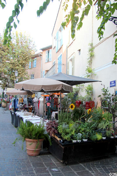 Outdoor restaurant seating along Rue Corbet. Sainte-Maxime, France.