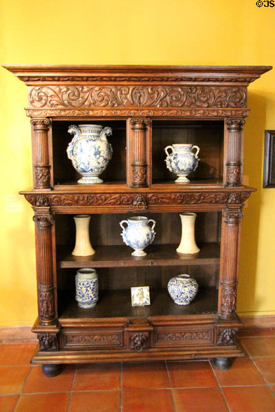 Carved cabinet with ceramics collection at Museum Angladon, Jacques Doucet Collection. Avignon, France.