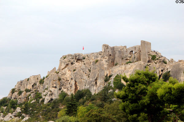 Les Baux castle blends with rock face which supports it. Les Baux, France.