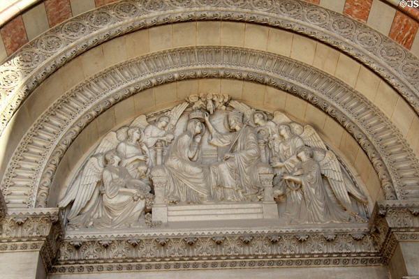 Crowning of Virgin Mary relief over entrance of Marseille Cathedral. Marseille, France.